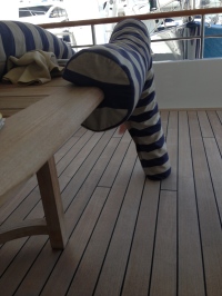 striped-canvas-on-railing-of-a-cylindar